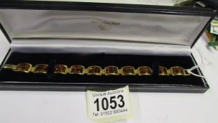A gold plate on silver amber bracelet marked 925.