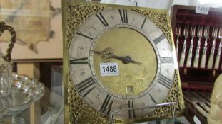 A brass Grandfather clock dial with movement.