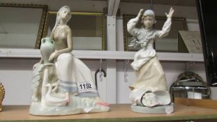 Two Lladro style figures.