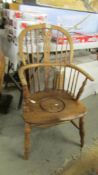 A 19th century Windsor style commode chair.