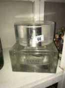A large Gucci Eau De Parfum perfumery/chemist shop display bottle, resin top, size 20cm x 20cm x