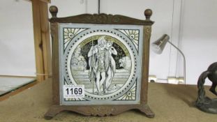 A square planter inset with four Minton tiles featuring Shakespeare scenes.