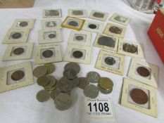 A mixed lot of USA, UK and French coins including 1923 one dollar. 1836 5 cent, 1945 shilling etc.