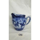 A Royal Doulton blue and white Eglington Tournament jug.