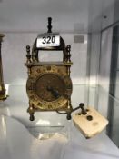 A Smiths electric brass lantern clock