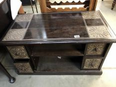 A dark wood stained coffee table with 4 drawers & 2 shelves - 92cm x 51cm x 50cm high