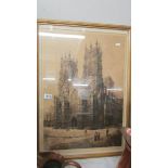 A framed and glazed print of a cathedral (possibly York Minster).