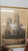 A framed and glazed print of a cathedral (possibly York Minster).