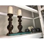 A pair of lustreware candlesticks with pillar candles, 3 chrome tea light holders and pottery