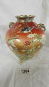 A beautiful Satsuma 8" high barrel shape vase with brownish orange ground hand painted