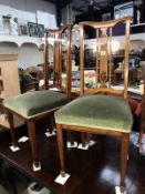 A pair of Edwardian inlaid mahogany hall chairs. *Collect Only*