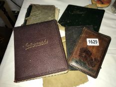 A collection of autograph/sketch books dated 1910 onwards & including leather wallets