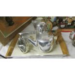 A Piquot four piece tea set on tray.