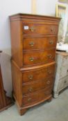 A small mahogany chest on chest.