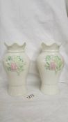 A pair of Belleek vases.