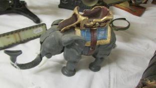 An 'elephant' mechanical money box.