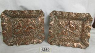 A pair of art nouveau hammered copper dishes, 15.5 x 13.5 cm.