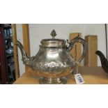 A good quality silver plate teapot (hinge needs repair).