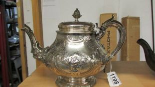 A good quality silver plate teapot (hinge needs repair).