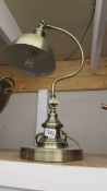 A good quality brass desk lamp.