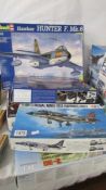 Five model aircraft kits including Revell and Tamiya (sealed bags).