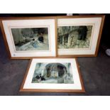 3 framed prints of Eastern European street scenes