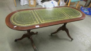 A leather topped coffee table.