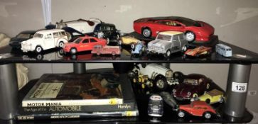 A quantity of die cast model cars & quantity of books mainly on cars (2 shelves)