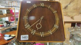 An art deco wall clock. (no weights)