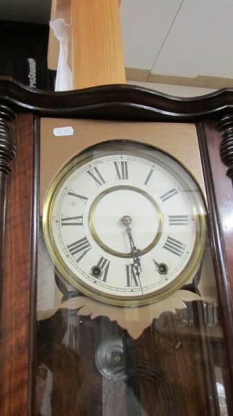 A Victorian mahogany wall clock. - Image 2 of 2