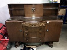 A 1930's/50's oak sideboard