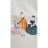 Three Royal Doulton figurines - Dinky do, Cherie HN2341 and Fair Lady HN5274.