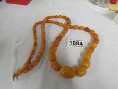 A long amber necklace.