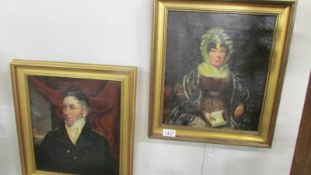 A pair of antique oil on canvas portraits.