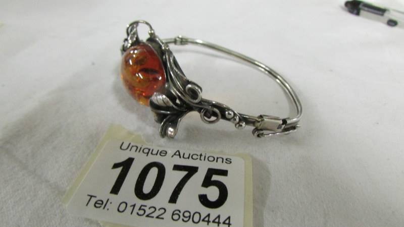 An oval amber and silver fancy work bracelet. - Image 2 of 2