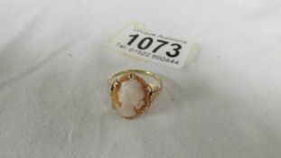 A 9ct gold cameo ring with female profile. Size R.