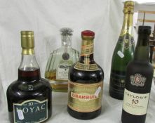 A bottle of Drambuie whisky, Noyal brandy, Taylors 10yr port, Brut champagne.
