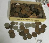 A large lot of Uk copper pennies and other coins.
