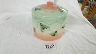 A Sally Tuffin Dennis China Works lidded pot with bee and beehive design.