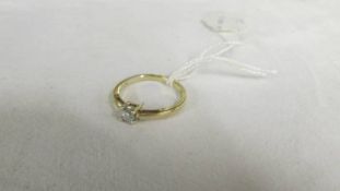 A Princess cut diamond solitaire ring, size N.