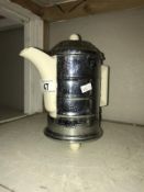 An art deco chrome plated insulated coffee pot