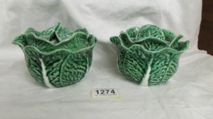 A pair of cabbage shaped pickle pots.