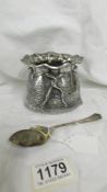 A silver sack shaped sugar bowl with silver spoon. 290 grams.