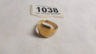 An 18ct gold signet ring, size O, 5.5 grams.