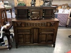 A 1930/50's oak buffet. 124cm x 48cm, Total height 123cm *Collect only*