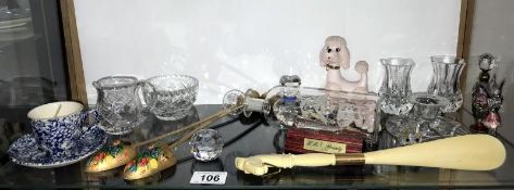 A shelf of miscellaneous collectables including cut glass, ship in bottle & pewter fairy etc.