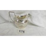 A silver cream jug, 115 grams.