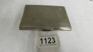 A silver cigarette case, 177 grams.