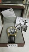 A boxed John Wayne wrist watch.