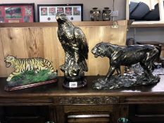 A bronze effect resin tiger figurine, a bronze effect planter golden eagle, etc